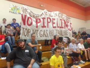 Bruce Edwards / Staff Photo Opponents of a natural gas pipeline made their views known at a public hearing Tuesday night in Middlebury.
