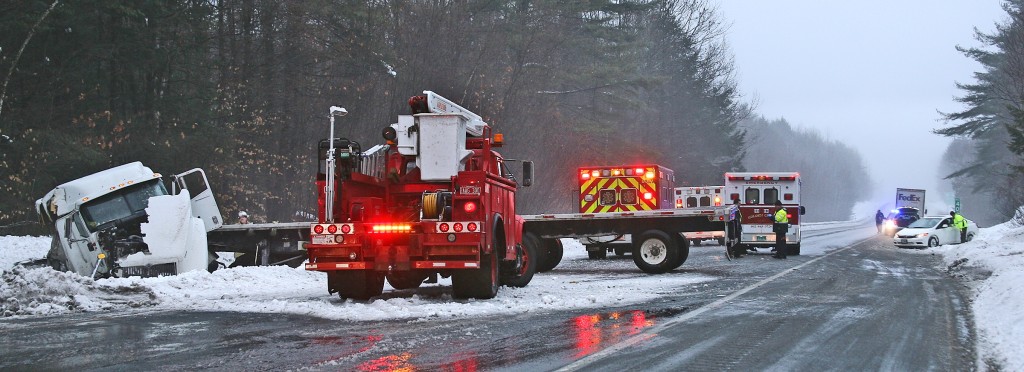 Photos by Len Emery A tractor-trailor loaded with transformers crashed with a car on Interstate 91 in Springfield around 7 a.m. and sent at least two people to the hospital.